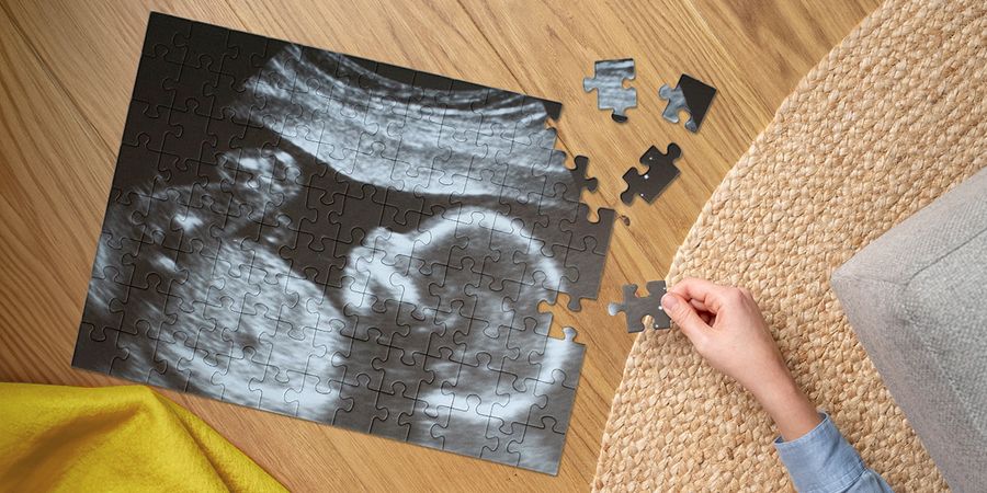 A baby ultrasound image on a personalised puzzle from Photobox, showcasing a unique baby shower game and fun baby shower activities.