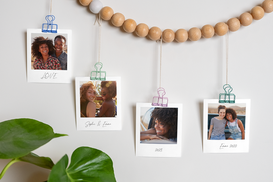Hanging photo prints used as a decoration idea for a hen party, creating a sentimental photo mural for a hen do with Photobox.