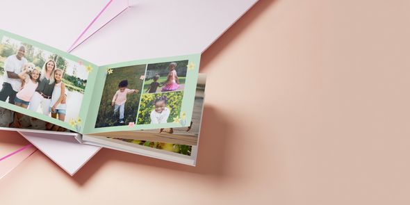 Photo book open showing family photos