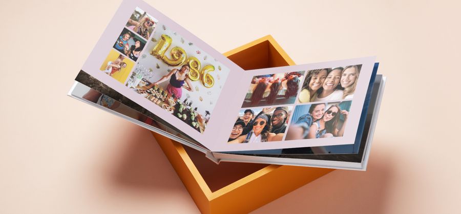 Photo book open showing family birthday photos