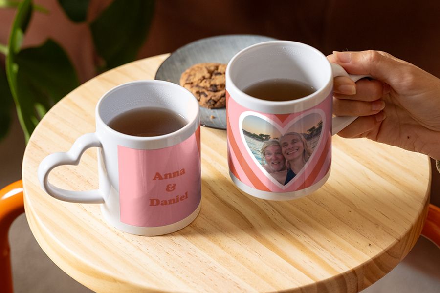 A personalised photo mug from Photobox featuring a happy couple and the names Anna & Daniel, a thoughtful choice for valentine's day gifts for her or valentines presents.