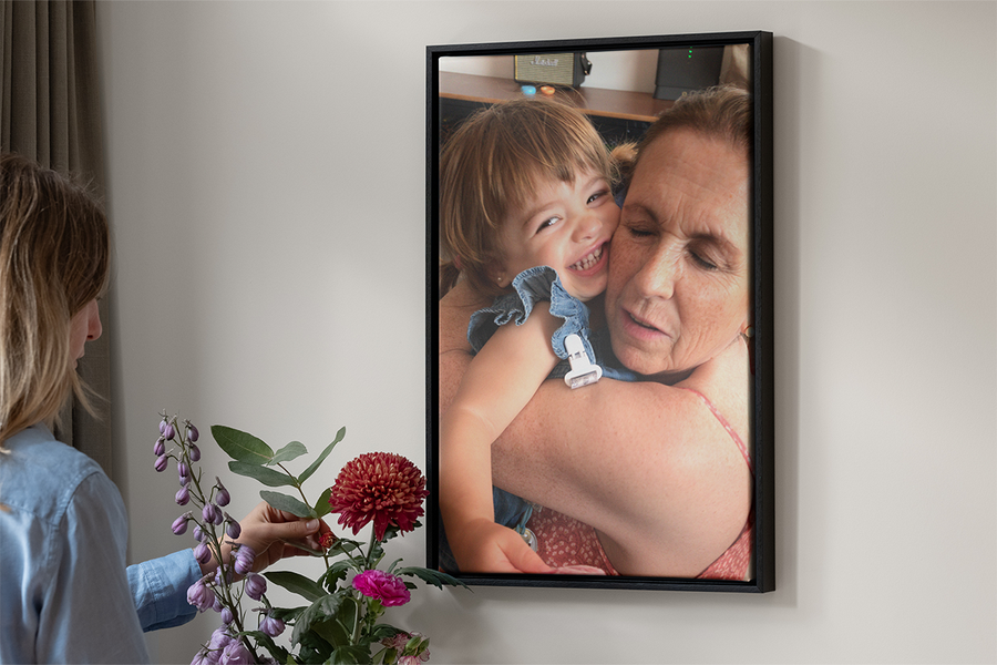 Photobox personalised wall art showing a mother and child hugging; a sentimental mother’s day gift for 2026.
