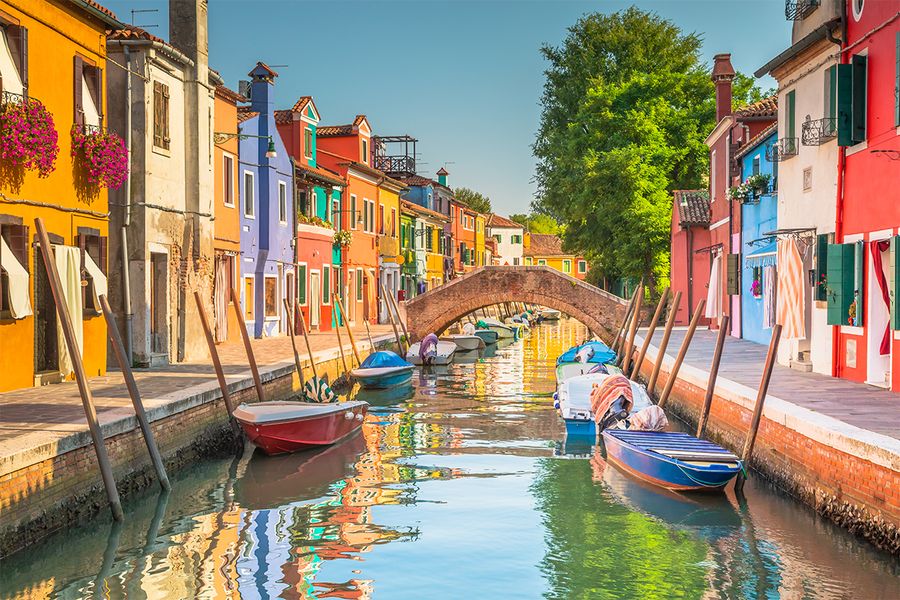 The historic and romantic Dorsoduro district in Venice, with its charming narrow canals and quiet bridges.