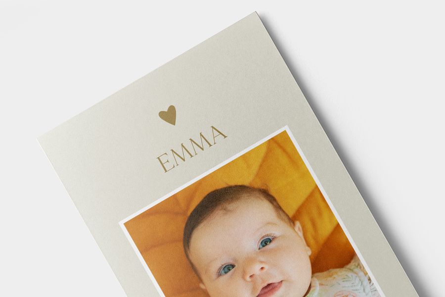 A matt photo print of a baby girl, showing the difference between matt and glossy.