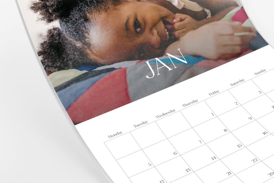 A personalised photo calendar, showing the difference between matt and glossy.