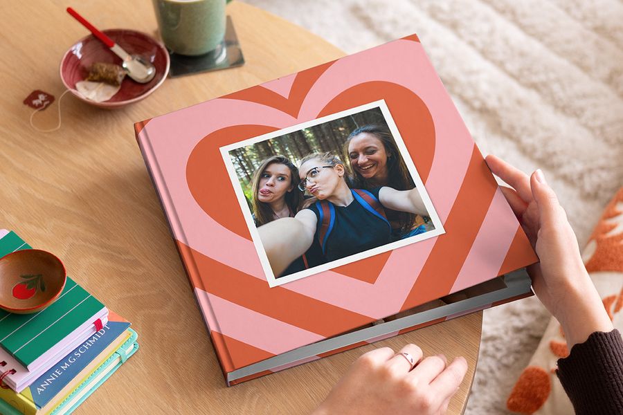 Celebrating Galentine's Day with a Photobox photo book for best friends, the ultimate Valentine's Day greeting that stays on the coffee table forever.