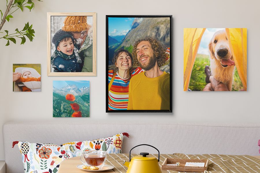 Examples of wall decor ideas, showcasing various styles like framed prints, canvas, and mounted photos for a picture wall.