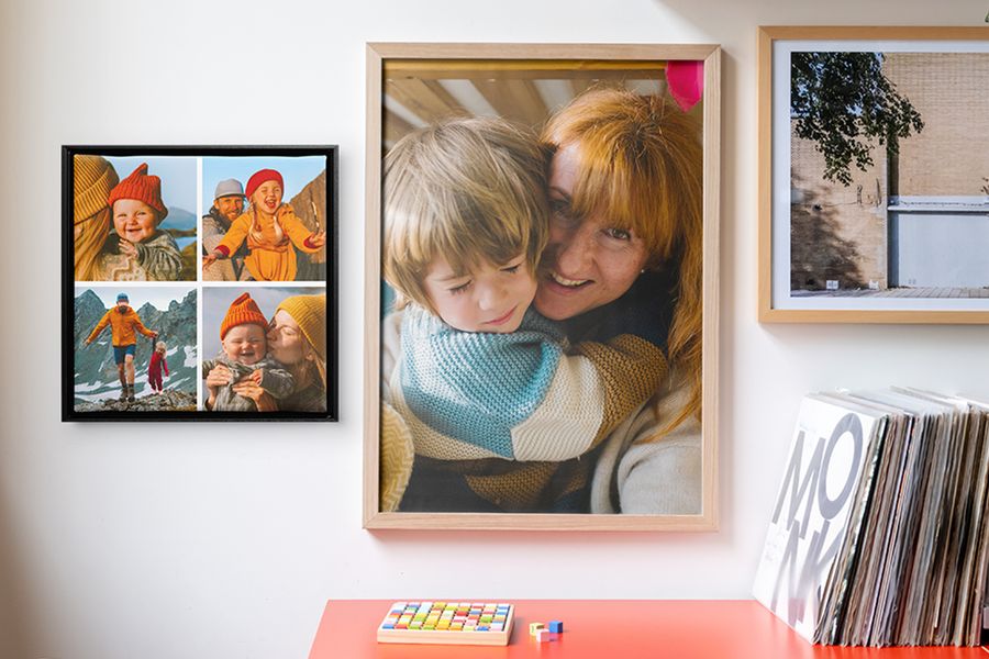 A selection of personalised wall art framed, showing a variety of family photos in high-quality frames on wall.
