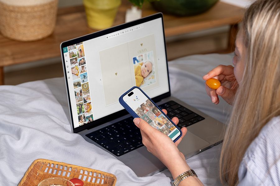 A person making personalised cards online across mobile and desktop devices, highlighting the easy-to-use card design online tools from Photobox.