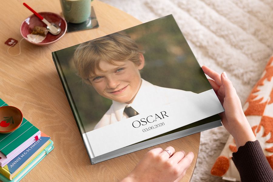 A personalised communion photo book filled with memories, showcasing how to create a meaningful first holy communion keepsake with Photobox.