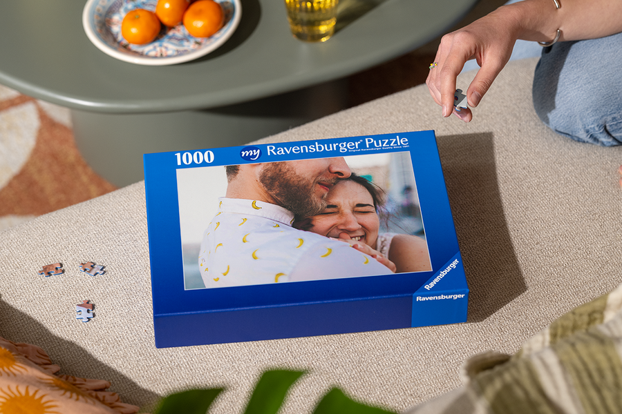 A personalised Photobox puzzle with a happy couple on the front, illustrating a hidden message puzzle as a creative proposal idea.